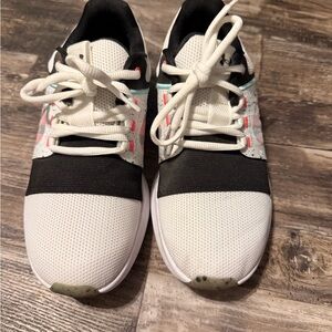 Under Armour woman’s ' Black and White Sneakers